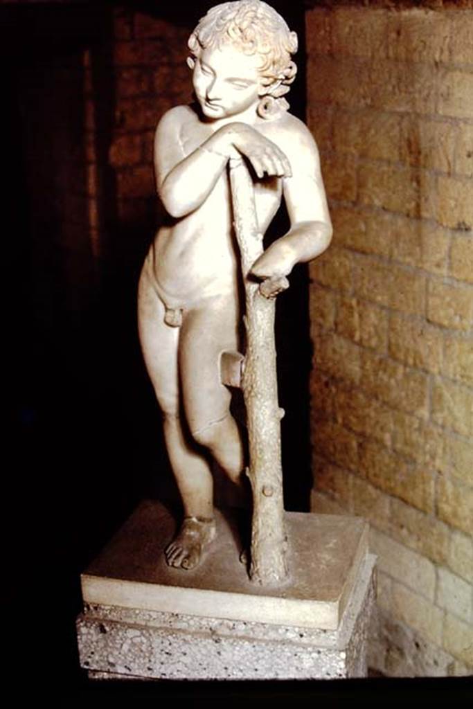 Herculaneum, 1978. Statue now seen on the memorial altar of Marcus Nonius Balbus.  
Photo by Stanley A. Jashemski.   
Source: The Wilhelmina and Stanley A. Jashemski archive in the University of Maryland Library, Special Collections (See collection page) and made available under the Creative Commons Attribution-Non-Commercial License v.4. See Licence and use details.
J78f0513